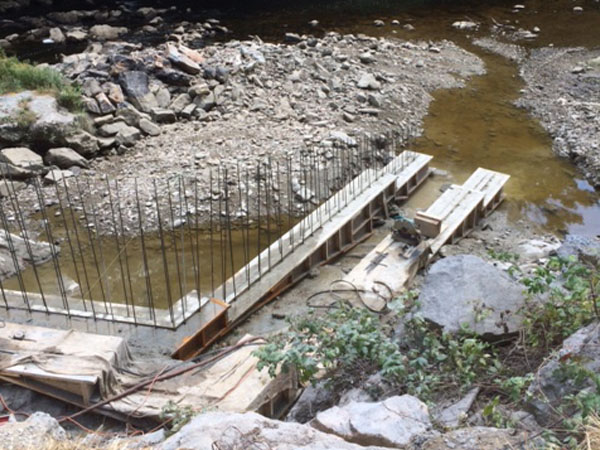 New passage included increasing the opening in the existing dam